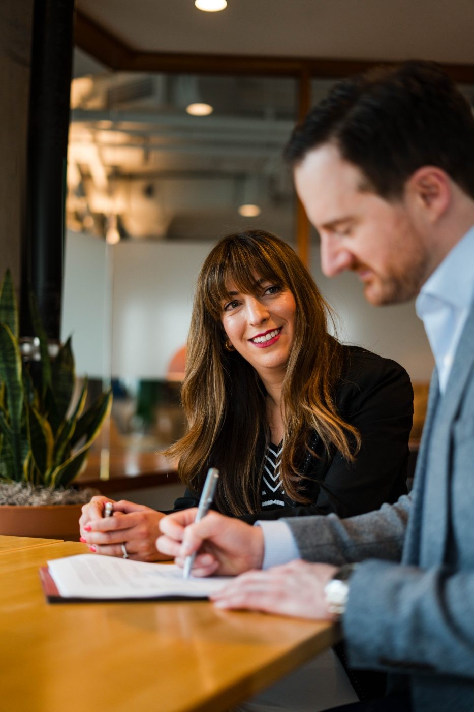 Estate planning attorney Judith del Cuadro-Zimmerman meeting with a client in Washington, D.C.